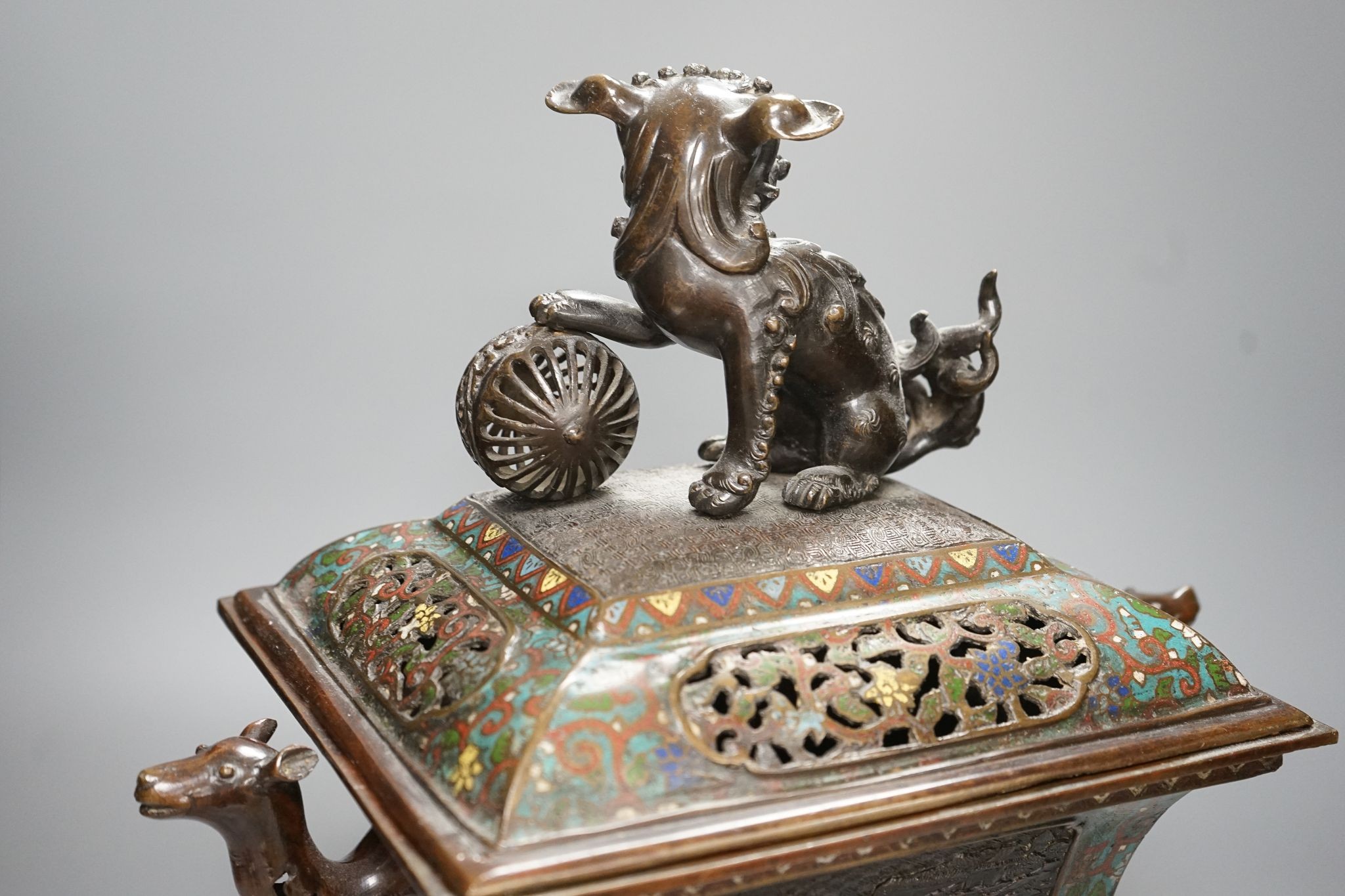 A large 19th century Japanese bronze and champleve enamel censer and cover, 40cm